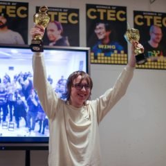Sidnev Holds Up 2 Trophies From His 2021 And 2022 CTEC Wins