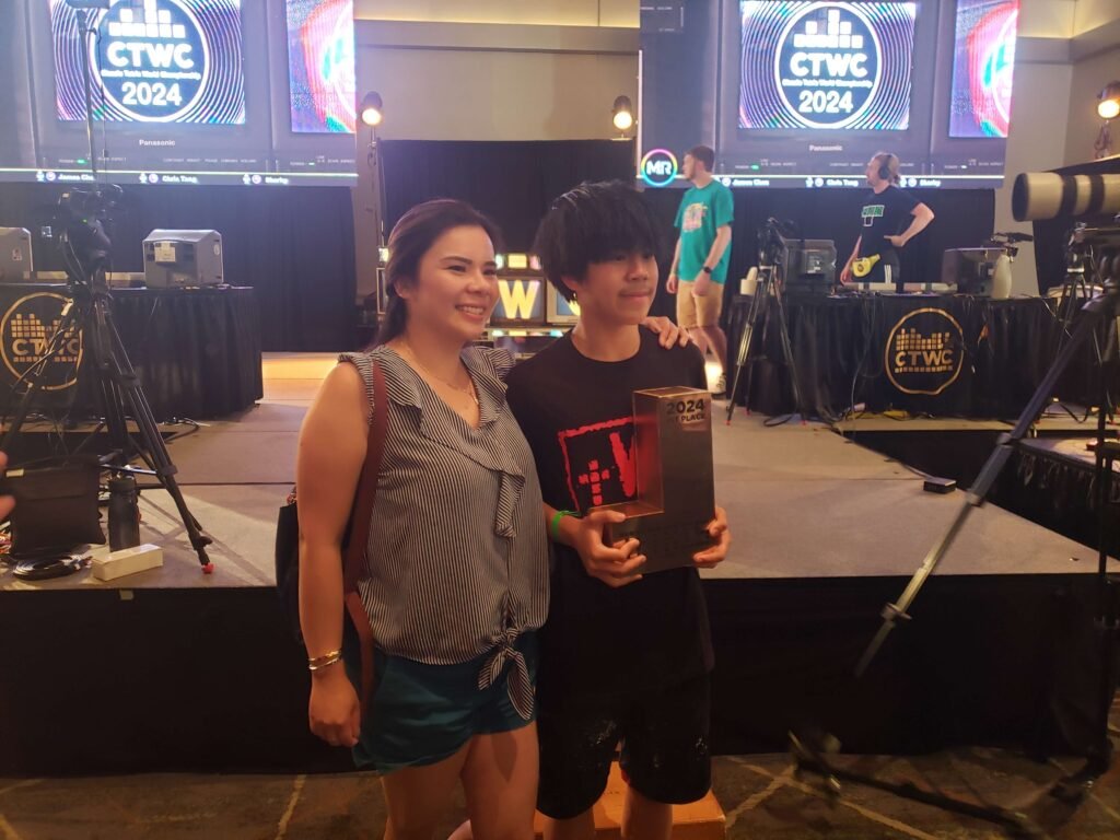 Alex T with the Golden J-Piece Trophy